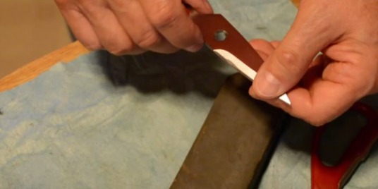 Flip and repeat on the beveled edge of the second blade Flip and repeat on the beveled edge of the second blade